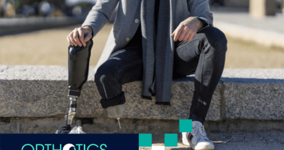A disabled young man with foot prosthesis sitting outdoor