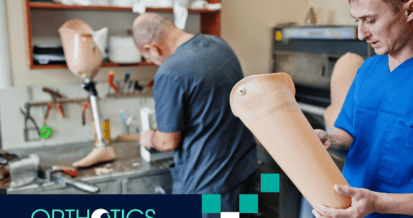 Two prosthetists working on prosthetic limbs