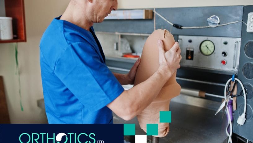 A prosthetist repairing a prosthetic limb